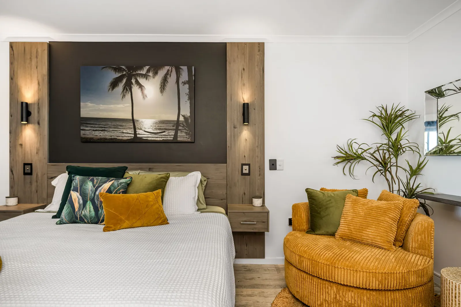 Guest room with king bed and reading chair