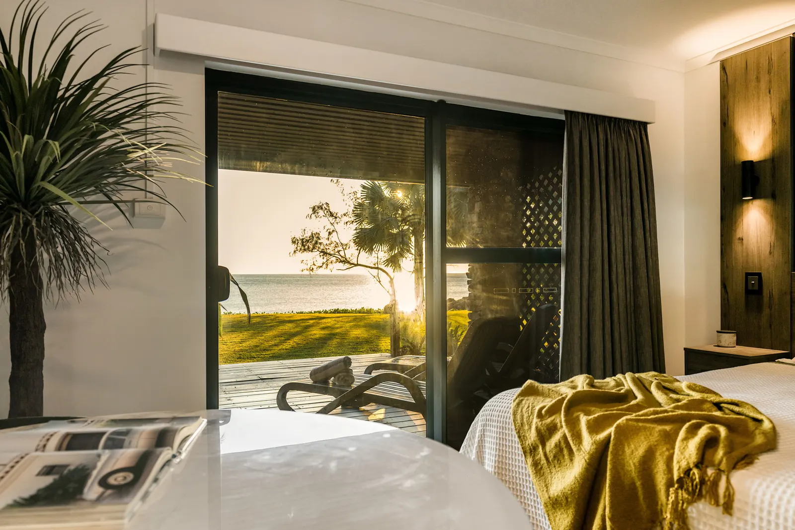 Guest room looking out to the lawn and sea